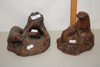 Lot 56 - Two bronzed resin models - badgers and an otter