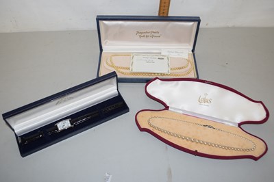 Lot 108 - Faux pearls and a wristwatch