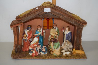 Lot 171 - A nativity scene with Jesus and Mary in the...