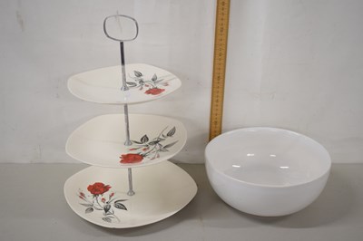 Lot 177 - A cake stand with floral decoration and...