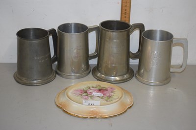 Lot 213 - Four pewter tankards and a teapot stand