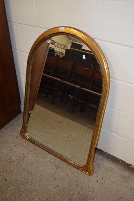 Lot 252 - An arched gilt framed wall mirror