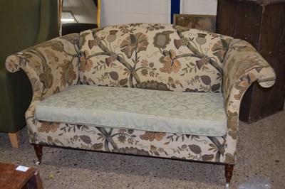 Lot 285 - A Victorian style floral upholstered sofa