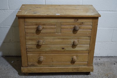 Lot 289 - A pine four drawer chest with turned knop handles