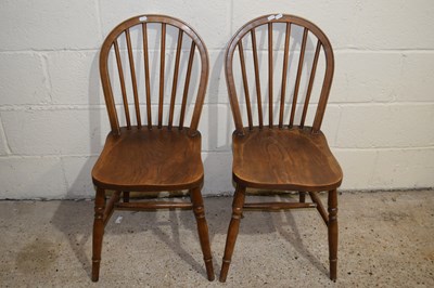 Lot 296 - Pair of elm seated stick back kitchen chairs