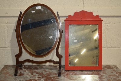 Lot 309 - A wall mirror in red painted frame together...