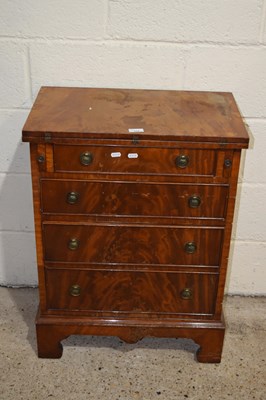 Lot 324 - A reproduction Georgian style bachelors chest...