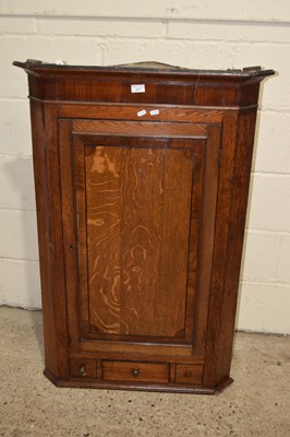 Lot 331 - A Georgian oak corner cabinet with single...