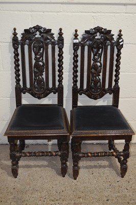 Lot 338 - A pair of Victorian oak Gothic style dining...