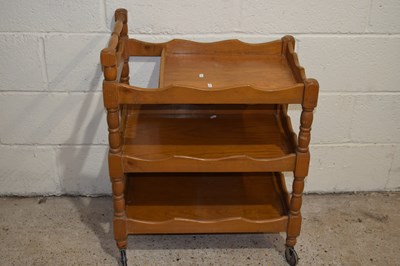 Lot 341 - A three tiered tea trolley