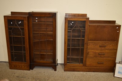 Lot 364 - An early 20th Century oak bureau bookcase...