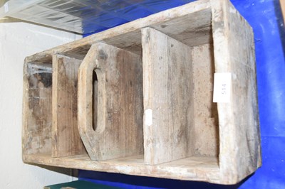 Lot 514 - A wooden storage box with carry handle