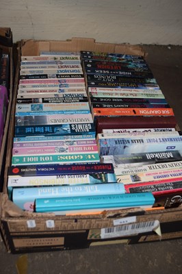 Lot 543 - Box of assorted paperbacks to include Tom Holt,...