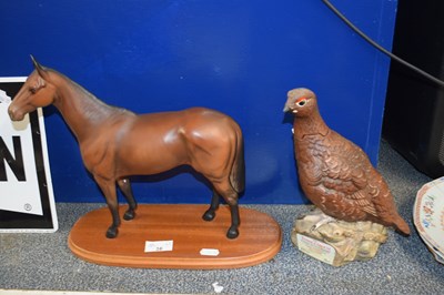 Lot 38 - A large Beswick porcelain horse on wooden...