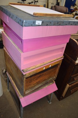 Lot 725 - A pink painted beehive