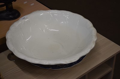 Lot 780 - Large cream ware bowl and a blue and white plate