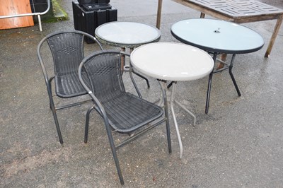 Lot 836 - Three circular garden tables and two chairs (5)