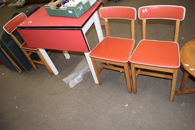 Lot 707 - A vintage red melomine topped drop leaf...