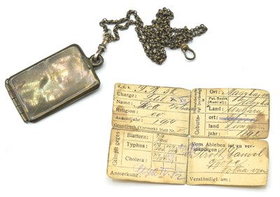 Lot 39 - Second World War German ID tag and paper for a...