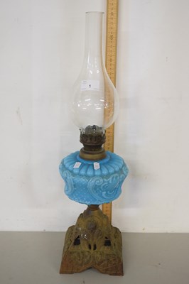 Lot 1 - Late Victorian oil lamp with pale blue glass font