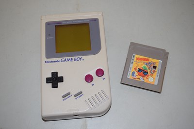 Lot 40 - A Nintendo Game Boy with Super Mario Land game...