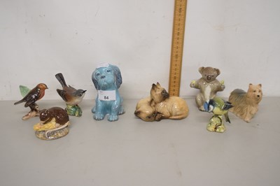 Lot 84 - A collection of small animal and bird models,...