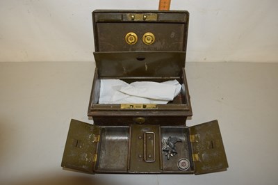 Lot 104 - A metal cash box and assorted items