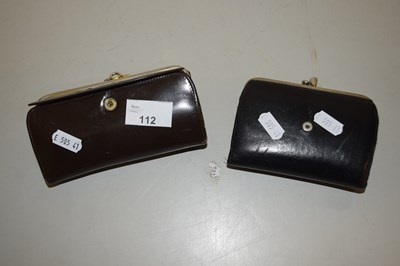 Lot 112 - Two leather purses and assorted coinage