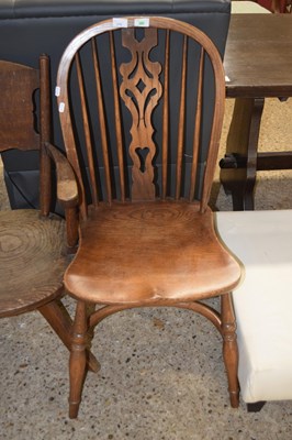 Lot 270 - An elm seated stick back dining chair with...