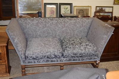 Lot 277 - A 20th Century oak framed sofa with blue...