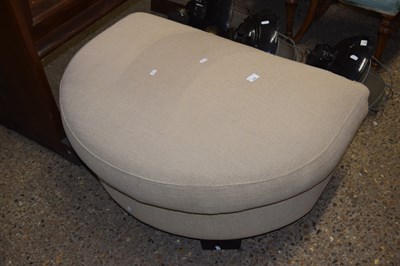 Lot 318 - A bow front footstool with oatmeal fabric...