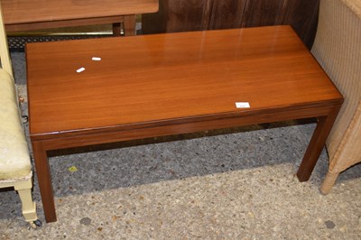 Lot 334 - A retro dark wood coffee table