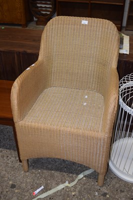 Lot 335 - A Lloyd Loom wicker armchair