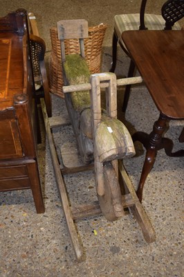 Lot 341 - A hardwood rocking motorbike