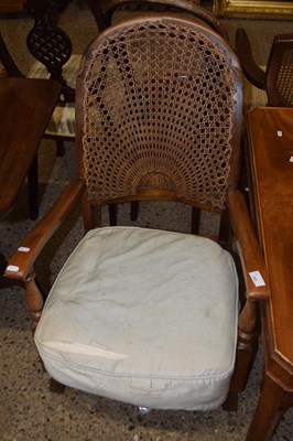 Lot 343 - An Art Deco style cane back open armchair