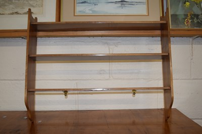 Lot 363 - A mahogany three tier shelf unit