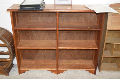 Lot 365 - A hardwood open front bookcase cabinet