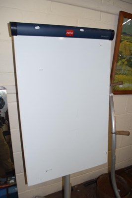 Lot 871 - A white board on casters