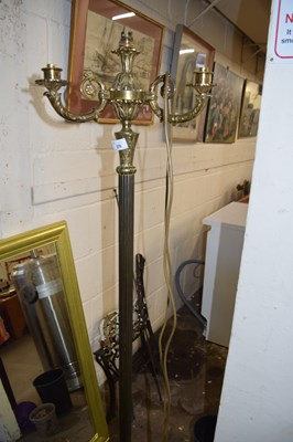 Lot 876 - A three branch brass standard lamp