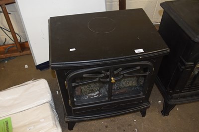 Lot 903 - A faux wood burning stove, electric