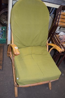 Lot 780 - A retro bamboo armchair and stool