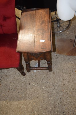 Lot 308 - Small oak drop leaf table with storage centre