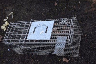 Lot 919 - A metal squirrel trap