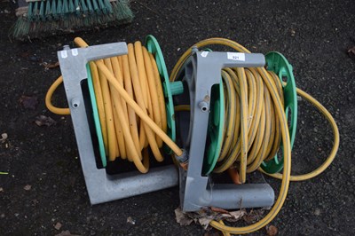 Lot 921 - Two reels of garden hose