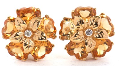 Lot 120 - A pair of citrine earrings, the flowerhead...