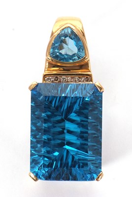 Lot 110 - A topaz and diamond pendant, the rectangular...