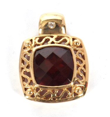 Lot 105 - A garnet and diamond pendant, the square fancy...