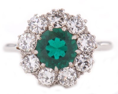 Lot 277 - A green paste and diamond ring, the central...