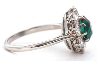 Lot 277 - A green paste and diamond ring, the central...