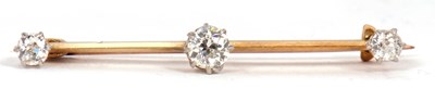 Lot 112 - A three stone diamond bar brooch, the three...